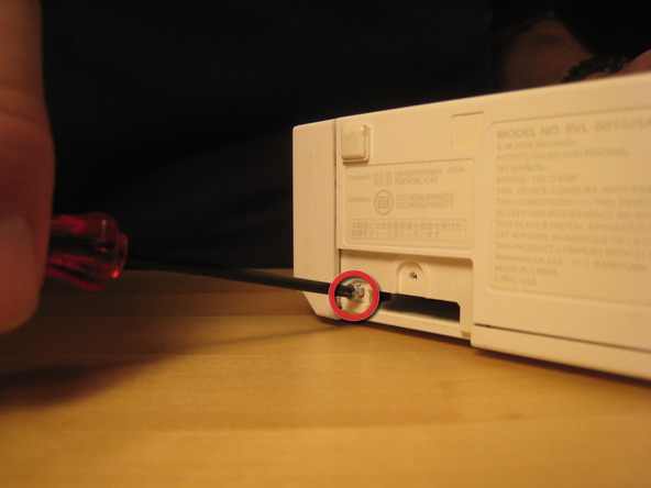 Как разобрать игровую консоль Nintendo Wii (13)