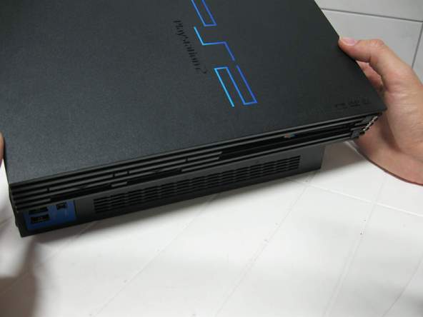 Как разобрать игровую консоль Sony PlayStation 2 (19)