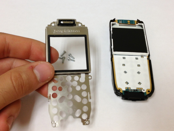 Как разобрать телефон Sony Ericsson J220i для замены разъёма зарядки (11)